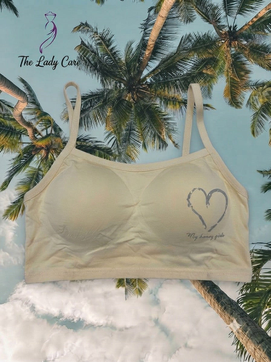 Padded Comfort Bralette
Featuring soft pastel shades, cozy padding, and an adorable heart print, this bralette is designed to keep you comfortable and stylish all day long.