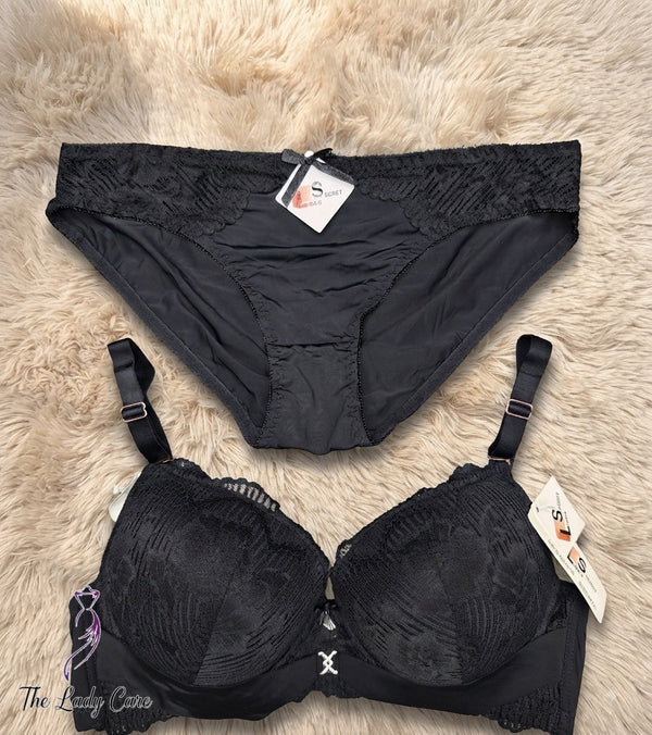 Crafted from a delicate, intricate floral lace pattern that covers the full cups, the wide under-bust band, and the matching panties. The lace is soft to the touch and high-quality.