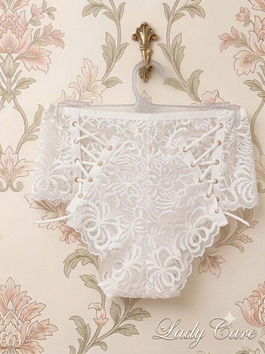 Intricate floral lace paired with side-tie detailing for the ultimate feminine charm a ( Pack OFF Three )