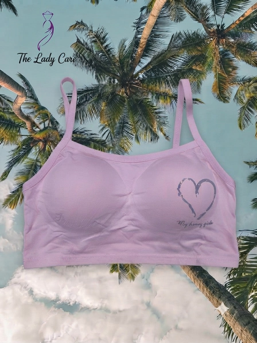 Padded Comfort Bralette
Featuring soft pastel shades, cozy padding, and an adorable heart print, this bralette is designed to keep you comfortable and stylish all day long.