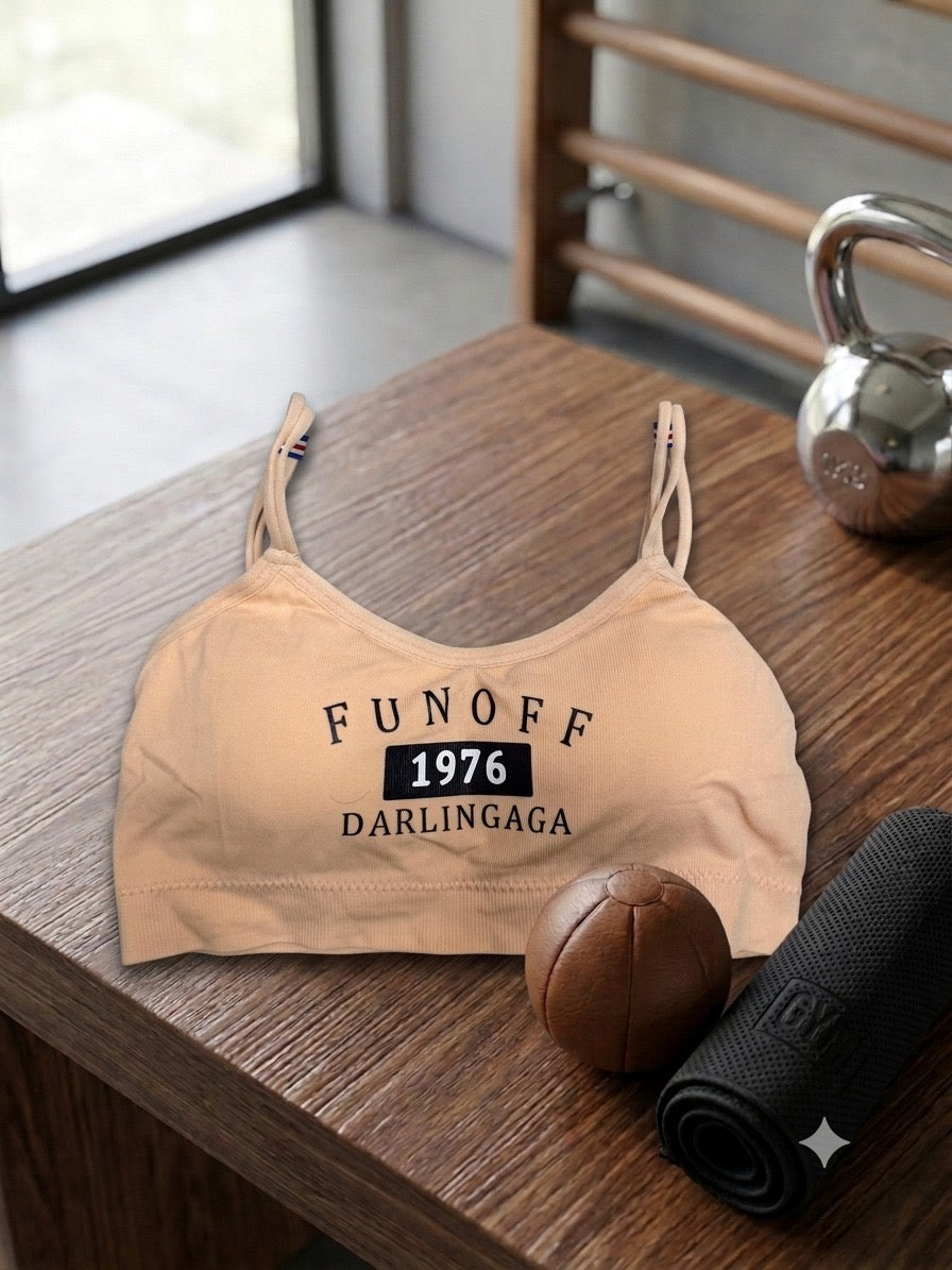 Where comfort meets effortless style.
Whether you're hitting the mat or keeping it casual, our newest graphic bralette keeps you looking chic 24/7.