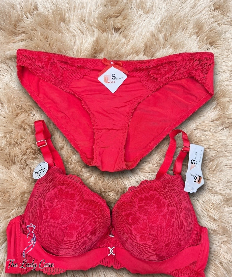Crafted from a delicate, intricate floral lace pattern that covers the full cups, the wide under-bust band, and the matching panties. The lace is soft to the touch and high-quality.