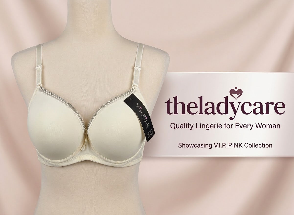 t-shirt bra featuring silver accent trim along the top of the cups, adjustable shoulder straps, and a small decorative bow at the center. It is displayed on a neutral female mannequin torso.