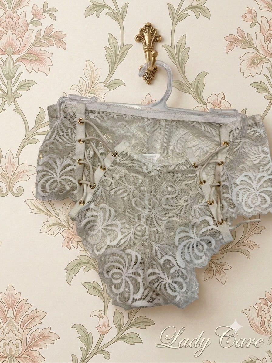Intricate floral lace paired with side-tie detailing for the ultimate feminine charm a ( Pack OFF Three )