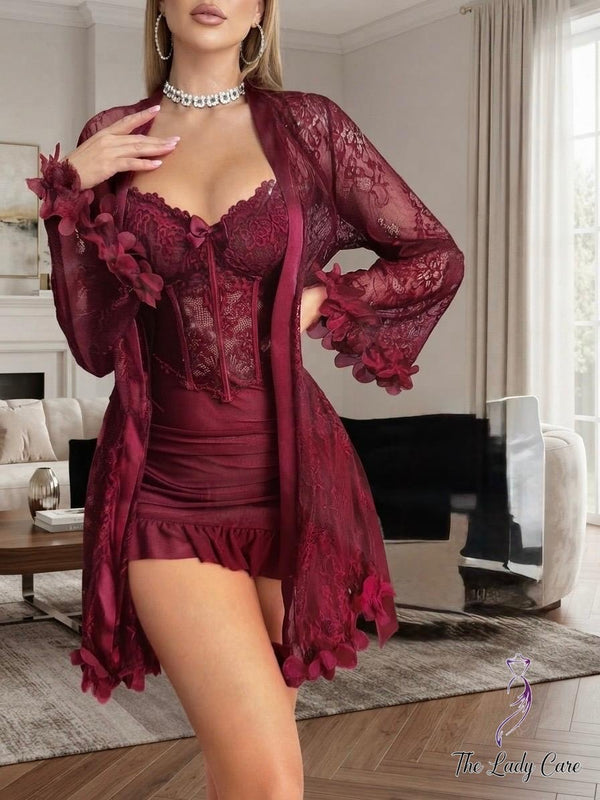 Indulge in luxury and sophistication with the stunning burgundy lingerie and sheer robe set from The Lady Care. Designed to make a statement, this exquisite ensemble blends romantic tones