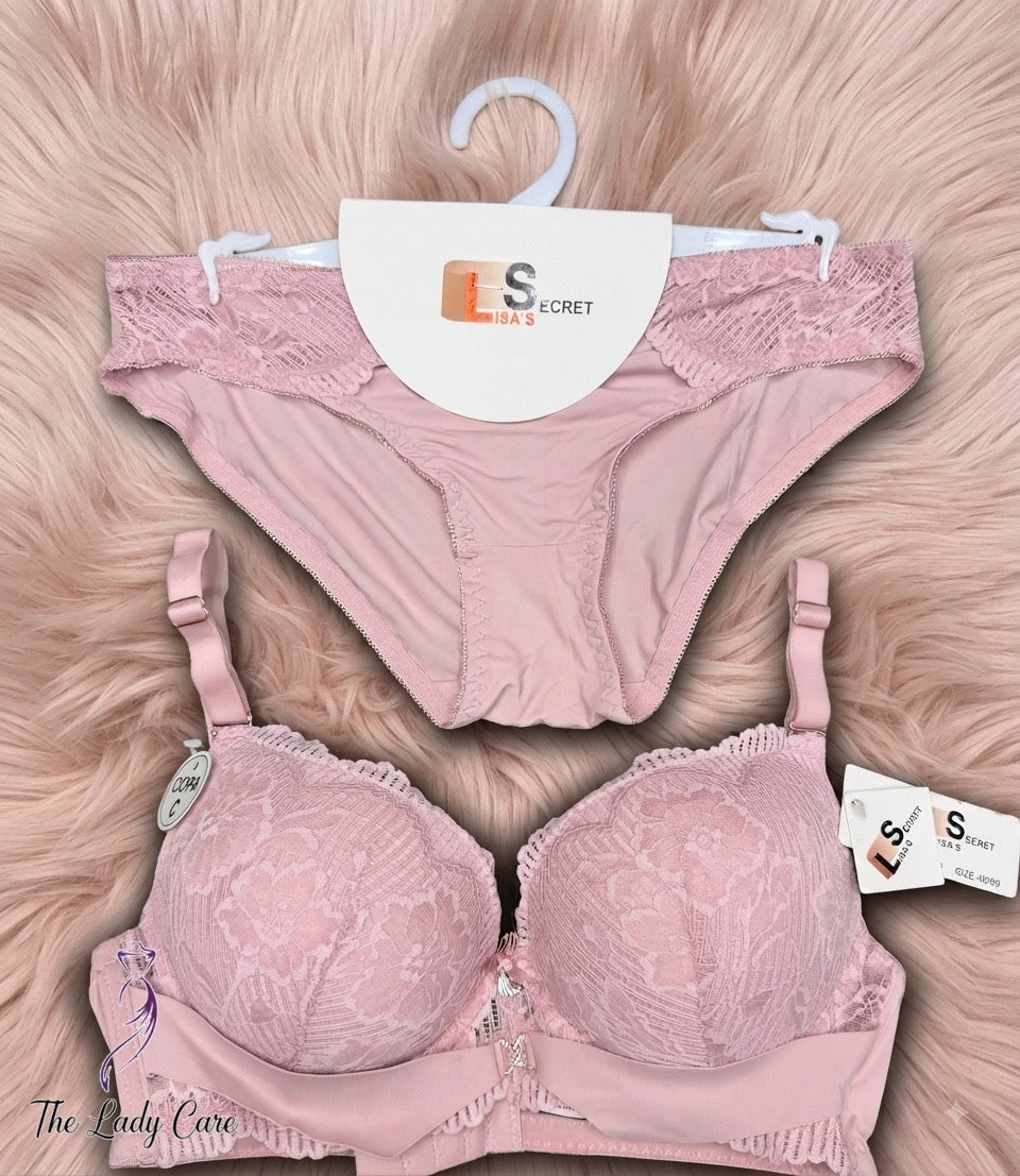 Crafted from a delicate, intricate floral lace pattern that covers the full cups, the wide under-bust band, and the matching panties. The lace is soft to the touch and high-quality.