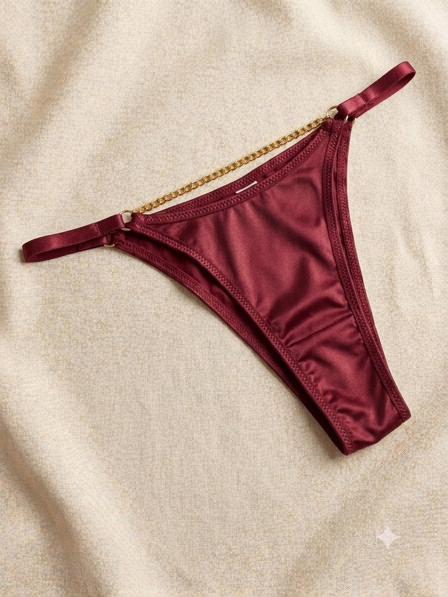 Elevate your essentials with this luxe satin and gold-chain detailed thong. ( Pack Of Four )